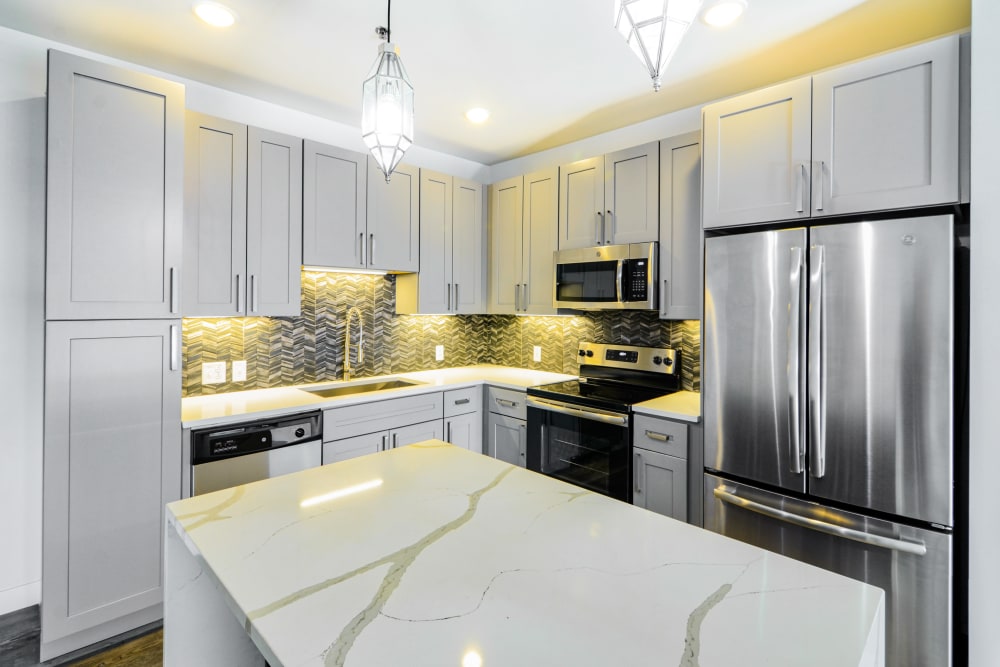 Kitchen with stainless steel appliances at Steelyard Apartments in St. Louis, Missouri