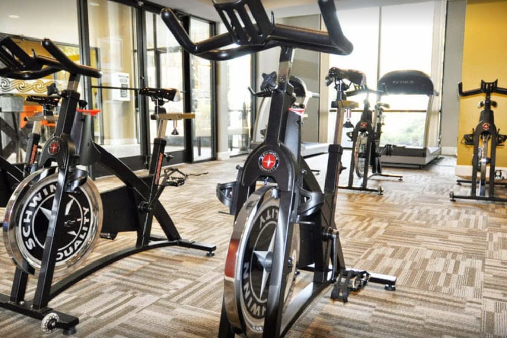 A fitness center with spin bikes at Goldelm at Metropolitan in Knoxville, Tennessee