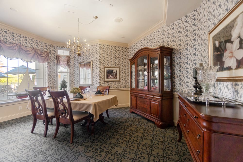 Private dining area with a large window and 1 table at The Hearth at Gardenside in Branford, Connecticut