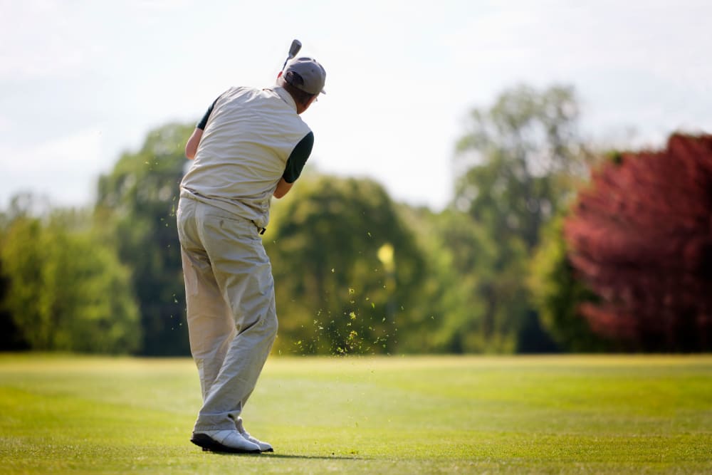 Resident playing golf near Campus Commons Senior Living in Sacramento, California