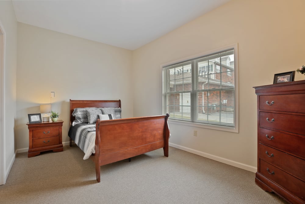 Bedroom in a senior apartment inside The Hearth at Hendersonville in Hendersonville, Tennessee