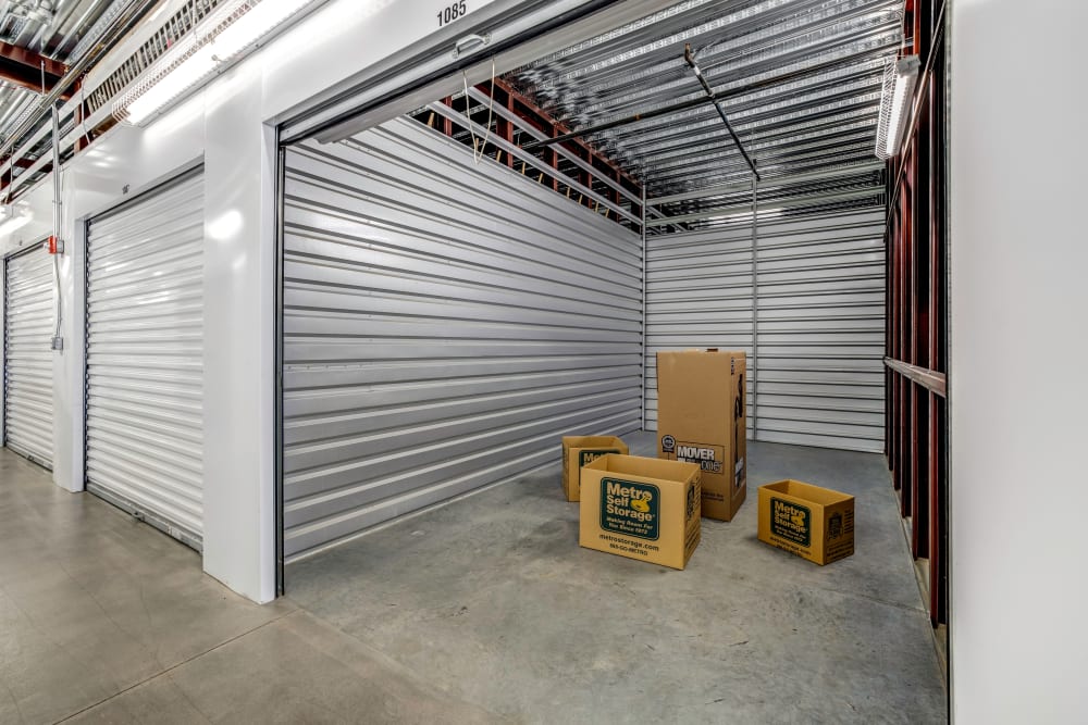 Indoor storage unit with sample boxes inside at Metro Self Storage in Franklin