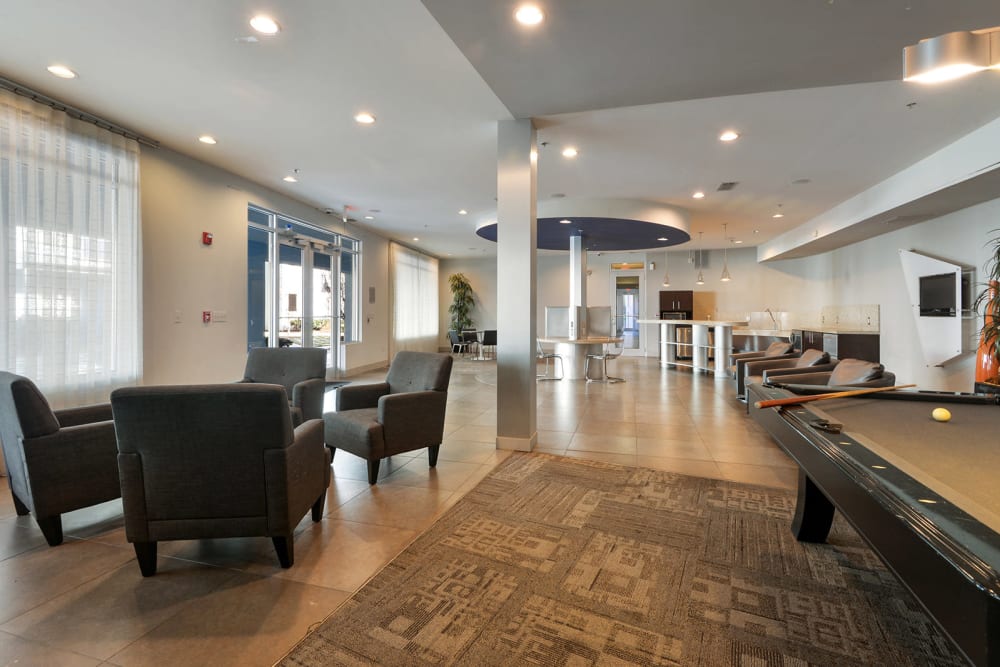 Clubhouse with a game room at Optimist Lofts in Atlanta, Georgia