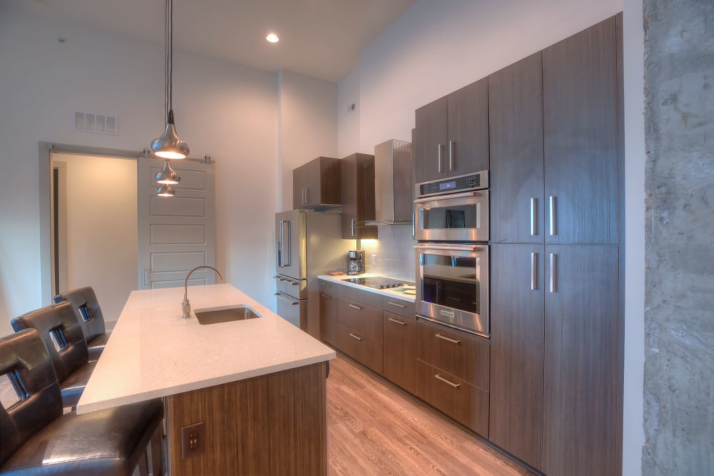 Kitchen with stainless steel appliances at Altitude in Atlanta, Georgia