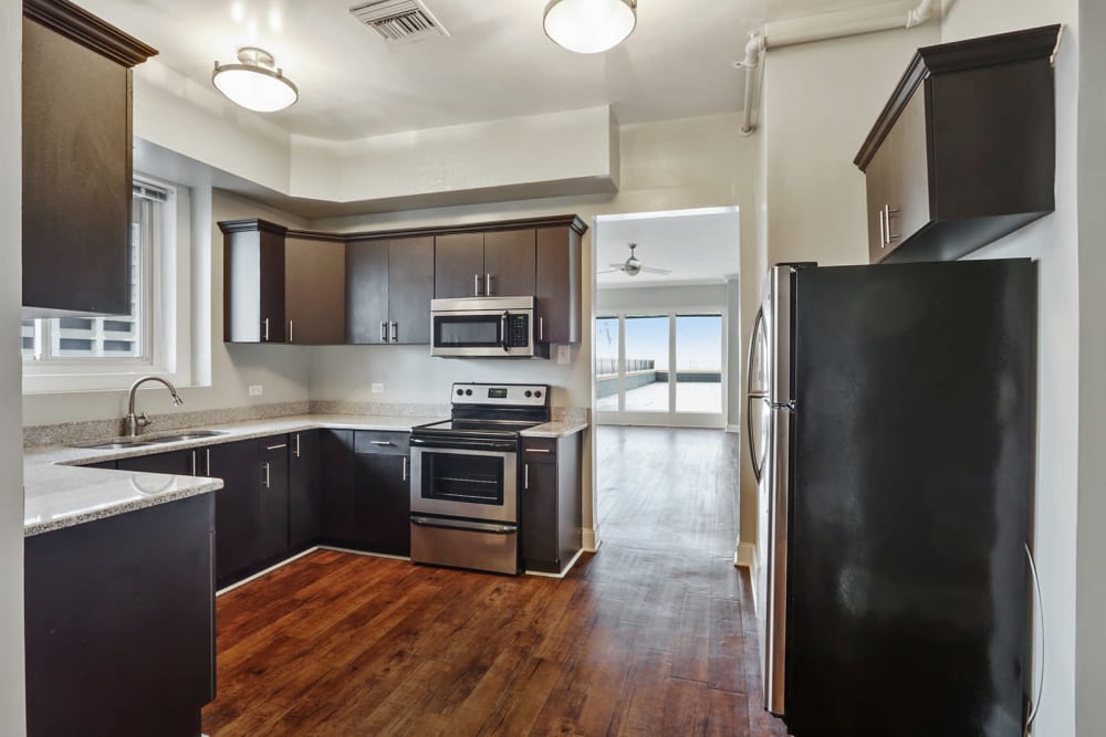 Kitchen with granite counters at Solace on Peachtree in Atlanta, Georgia