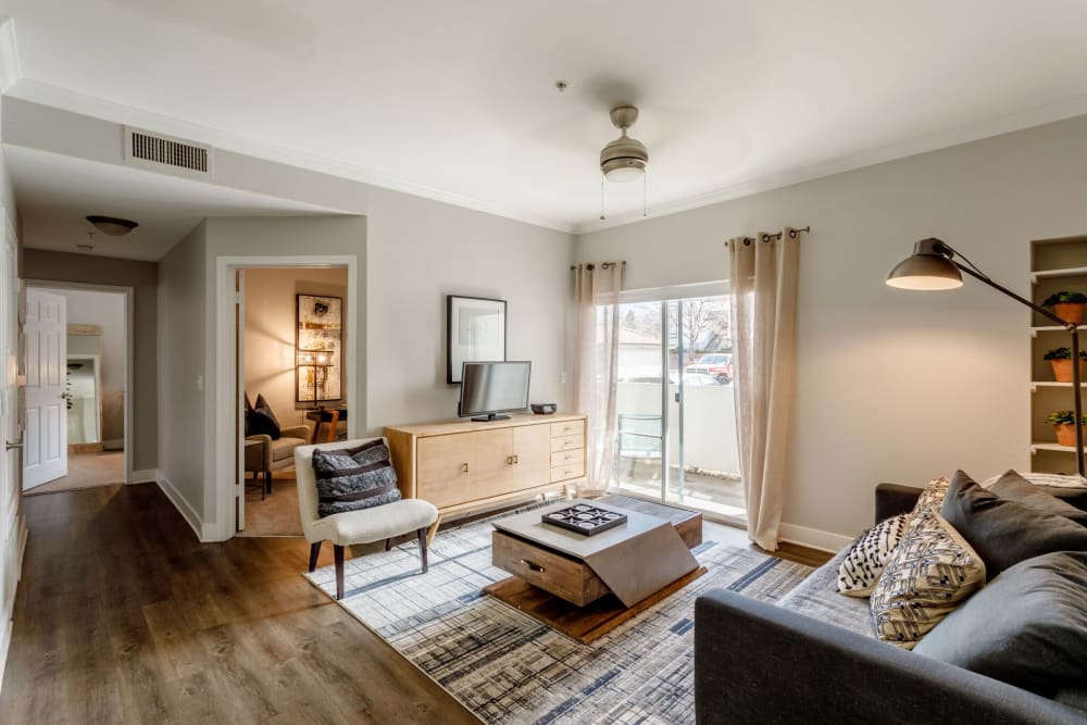 Spacious sunlit living room at Altitude Westminster in Westminster, Colorado