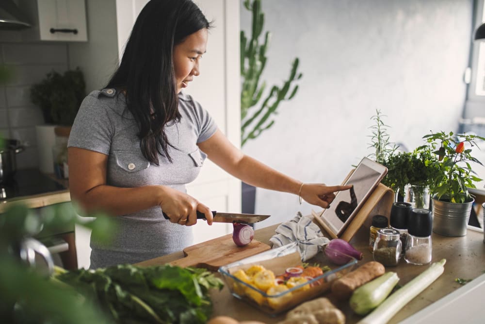 Resident prepping food at Optimist Lofts in Atlanta, Georgia