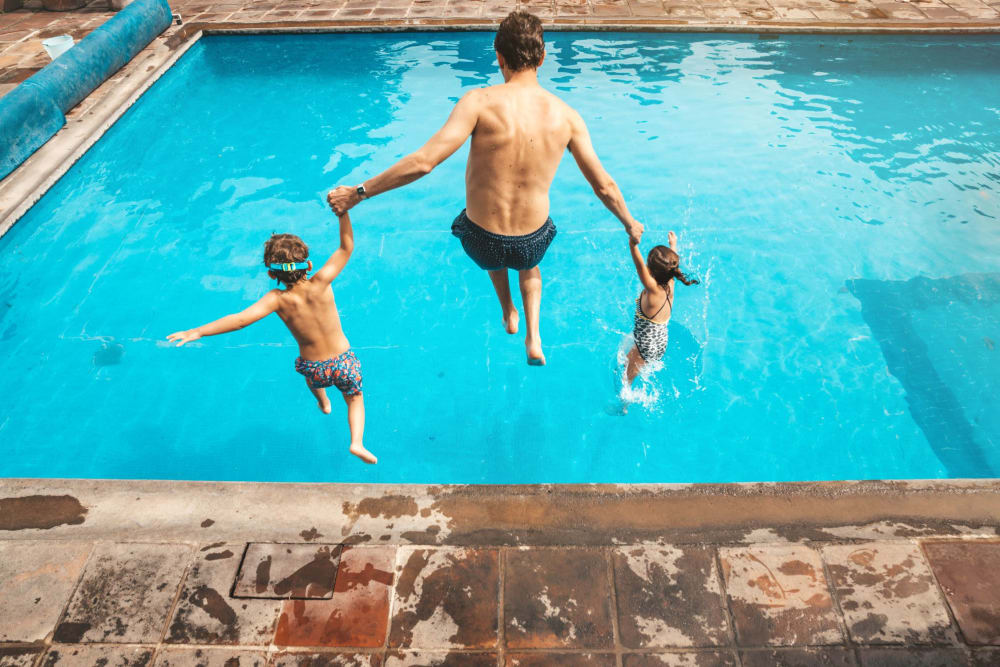 Family enjoying the swimming pool at Autumn Ridge in Waukee, Iowa