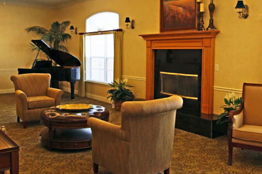 Fireplace seating at Grand Villa of Palm Coast in Palm Coast, Florida