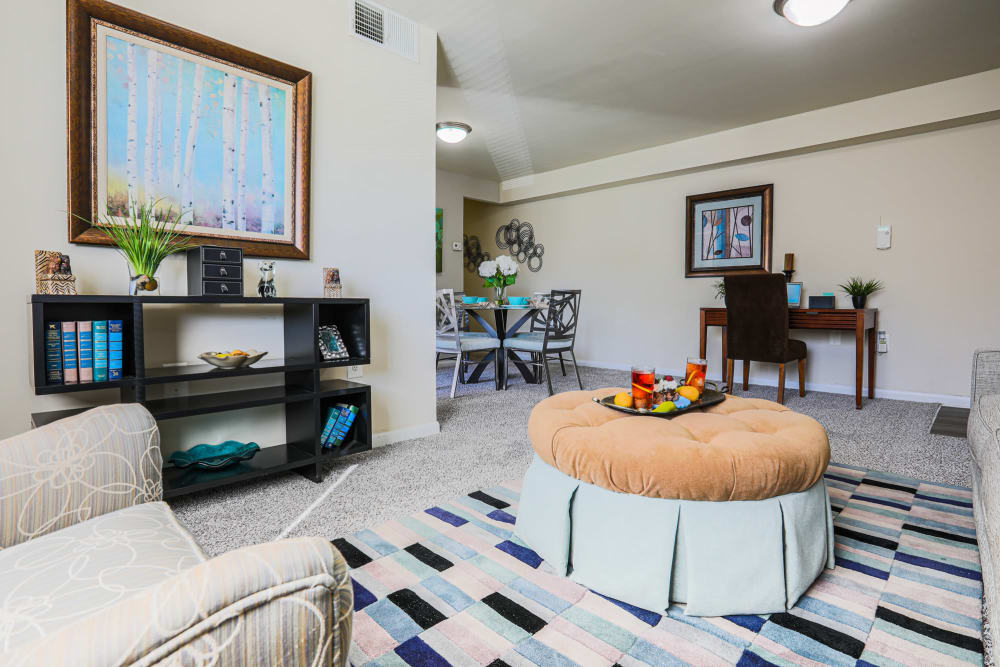 A dining room and living room at Regency Pointe in Forestville, Maryland