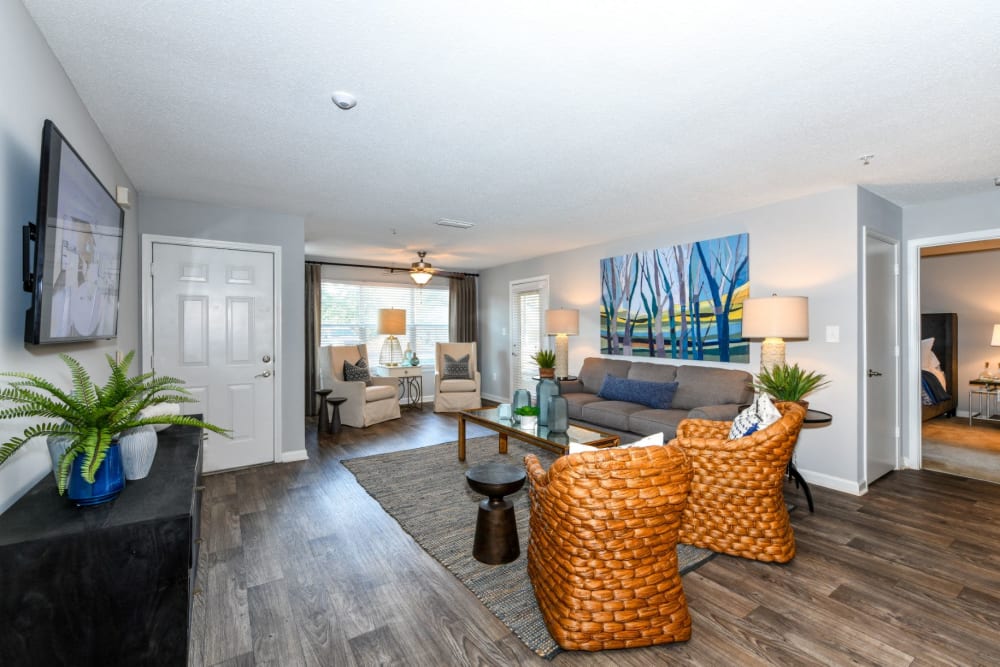 Spacious living room with patio access at 900 Dwell in Stockbridge, Georgia