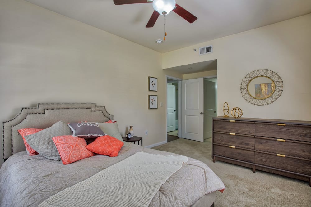 Bedroom with ceiling fan in Atkins Circle Apartments & Townhomes in Charlotte, North Carolina