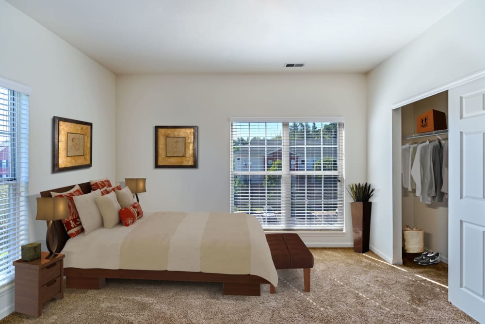 Big bedroom with carpeted floors and large windows at Christopher Wren Apartments & Townhomes in Wexford, Pennsylvania