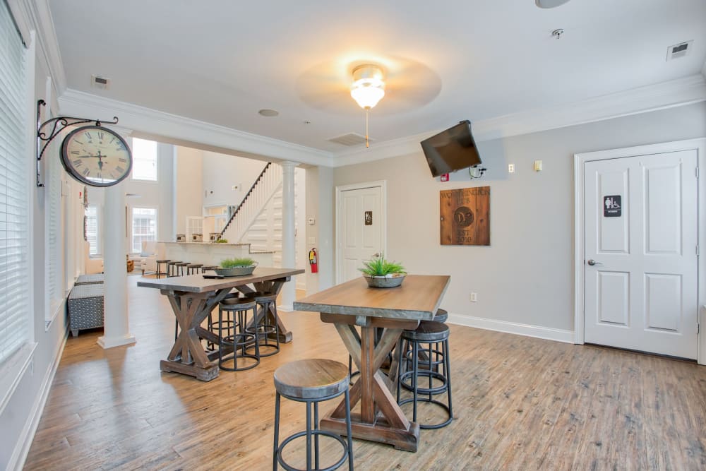 Tables to sit at in the clubhouse at Worthington Apartments & Townhomes in Charlotte, North Carolina