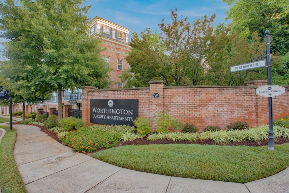 Worthington Apartments & Townhomes sign in front of apartments in Charlotte, North Carolina