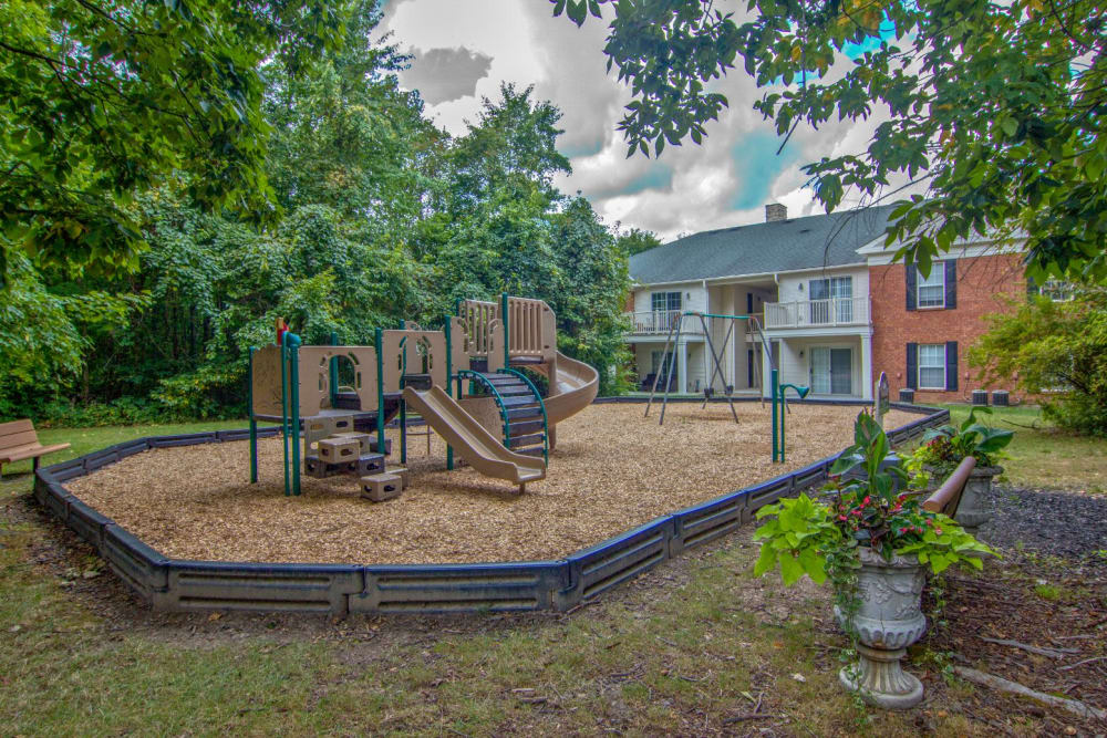 Playground at park in Westerville, Ohio at The Woods at Polaris Parkway Apartments & Townhomes