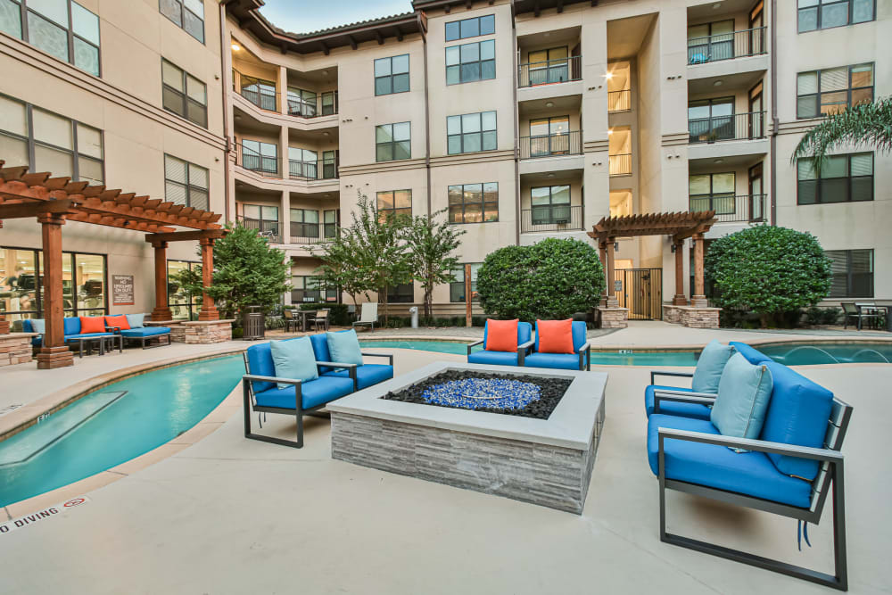 Fire pit by pool at Broadstone Toscano in Houston, Texas