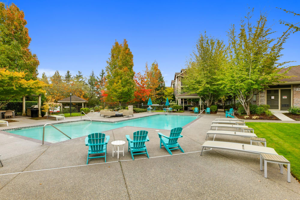 A hot tub surrounded by lush landscaping at The Grove at Orenco Station in Hillsboro, Oregon