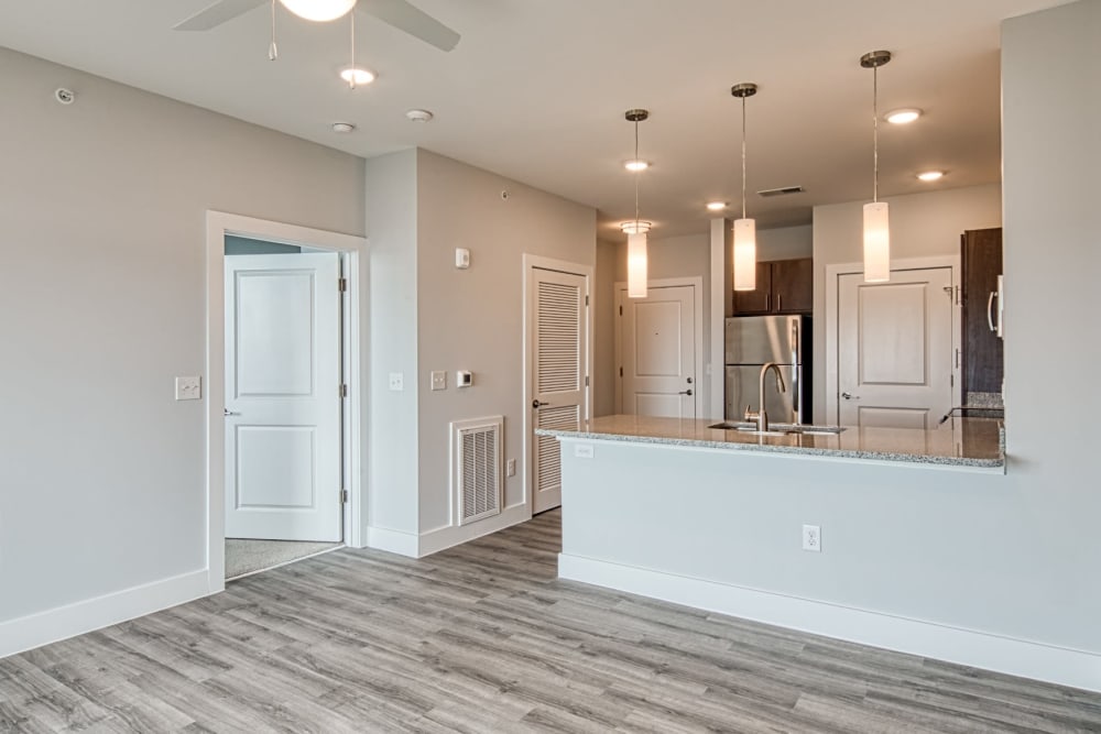 A spacious living room with a ceiling fan at Marina Villa in Norfolk, Virginia