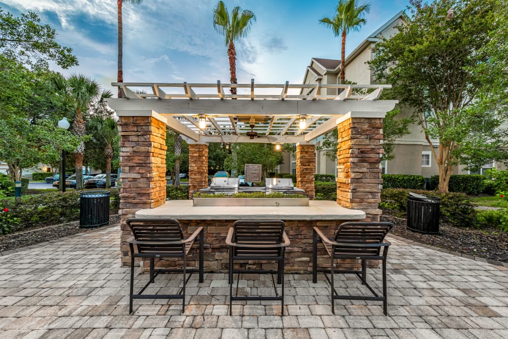 Lovely outdoor grilling and chilling area at Eddison at Deerwood Park in Jacksonville, Florida