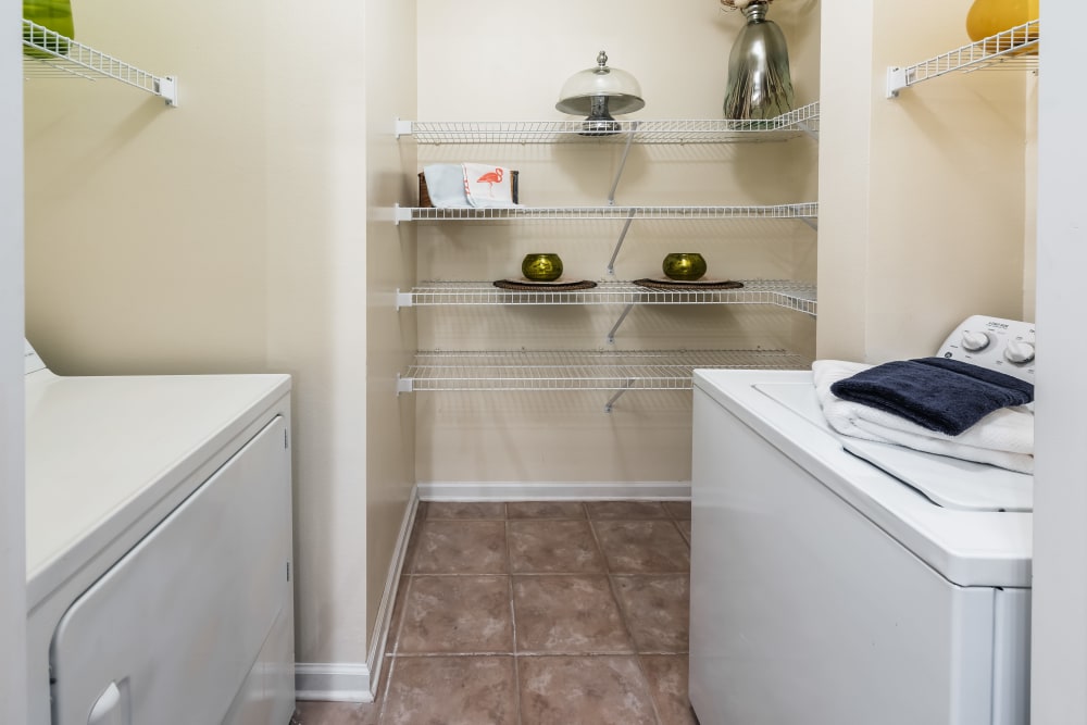 Washer and dryer in unit at Eddison at Deerwood Park in Jacksonville, Florida