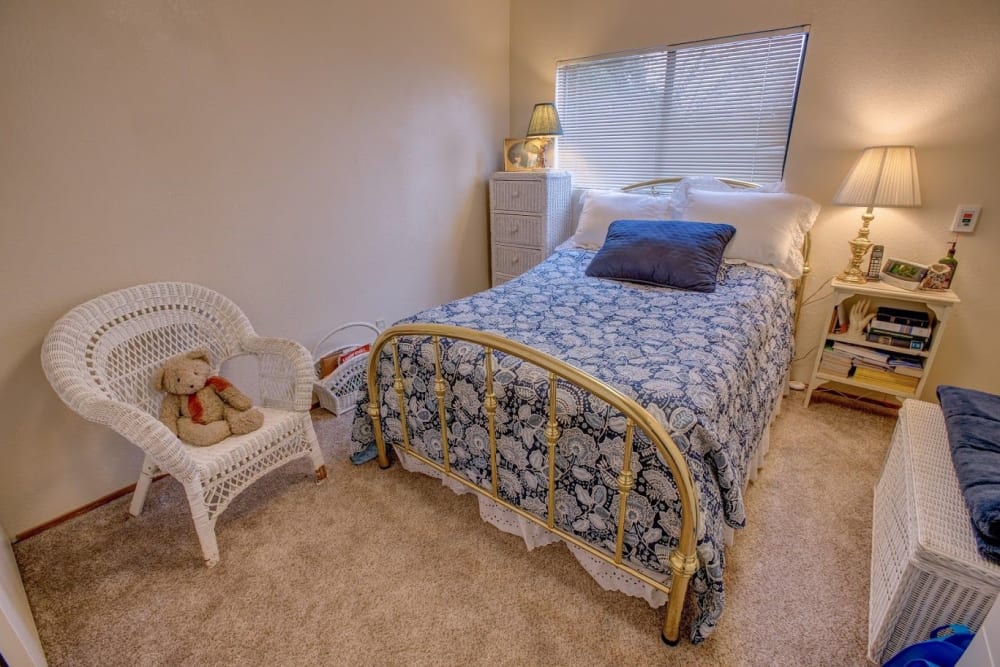 Cozy bedroom at Golden Pond Retirement Community in Sacramento, California