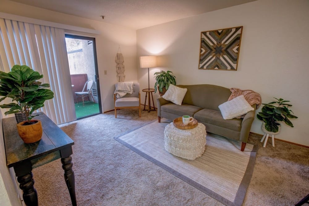 Living room with slider at Golden Pond Retirement Community in Sacramento, California