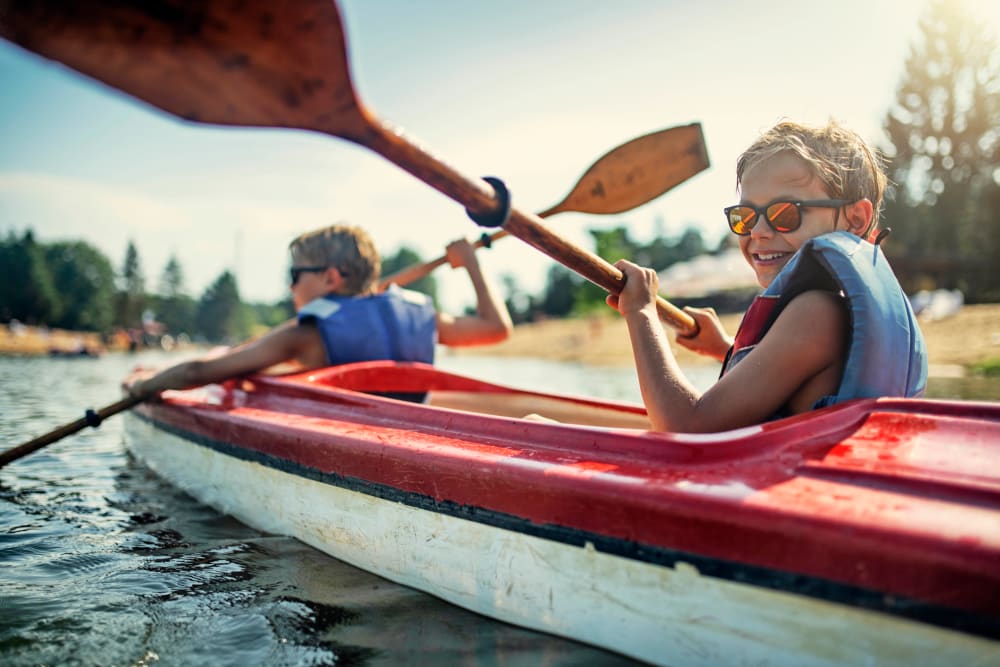 Tow kids kayaking in Glen Burnie, Maryland near Glen Hollow Apartments