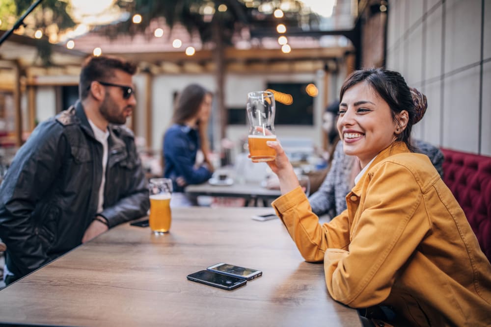 Couple enjoying beers in Aberdeen, Maryland near Winston's Choice Townhomes