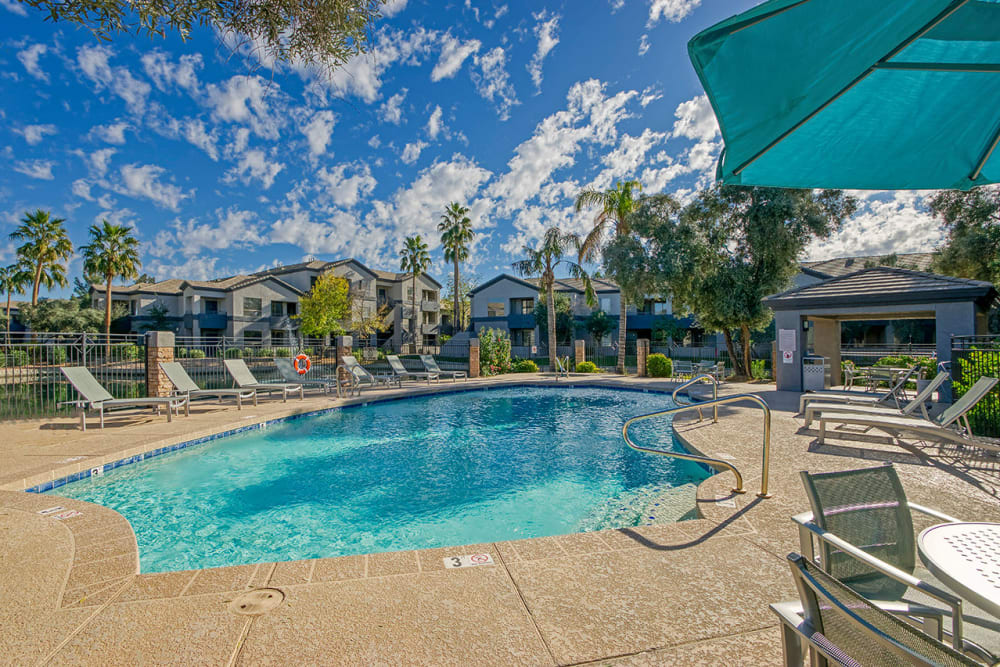 Beautiful swimming pool at dusk at Laguna at Arrowhead Ranch in Glendale, Arizona