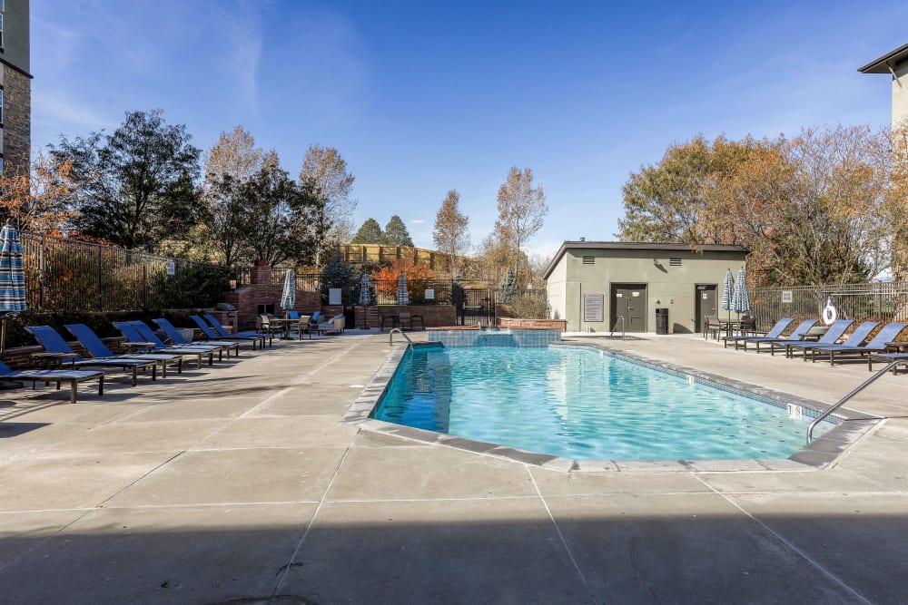Resort-style swimming pool at Summit at Flatirons Apartments in Broomfield, Colorado