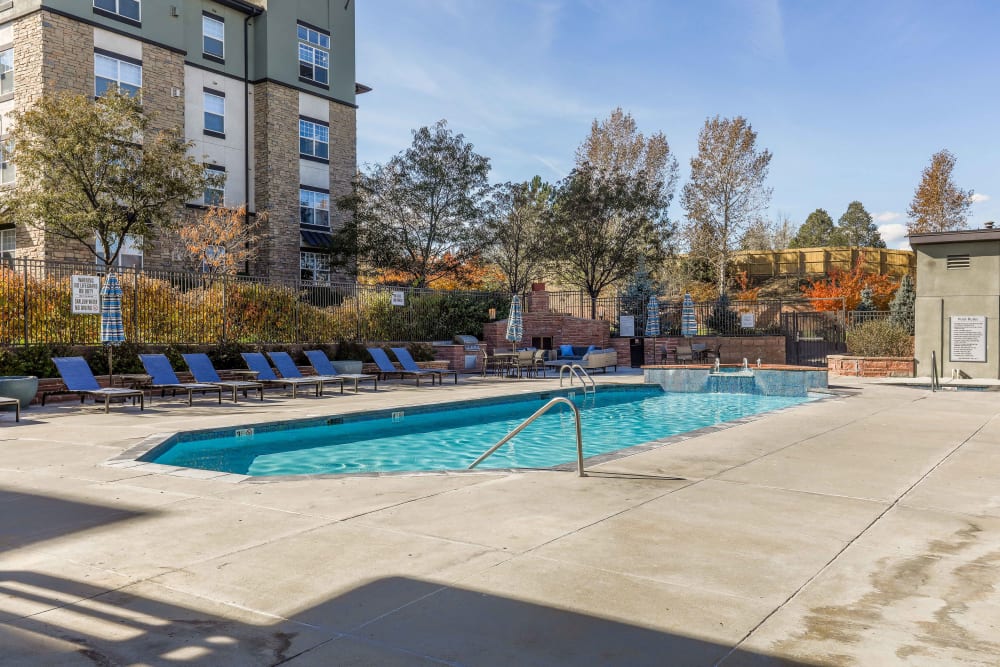 Sparkling swimming pool at Summit at Flatirons Apartments in Broomfield, Colorado