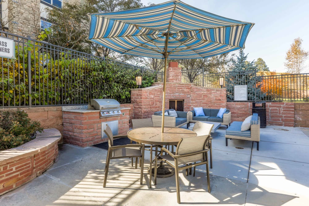 Outdoor patio area at Summit at Flatirons Apartments in Broomfield, Colorado