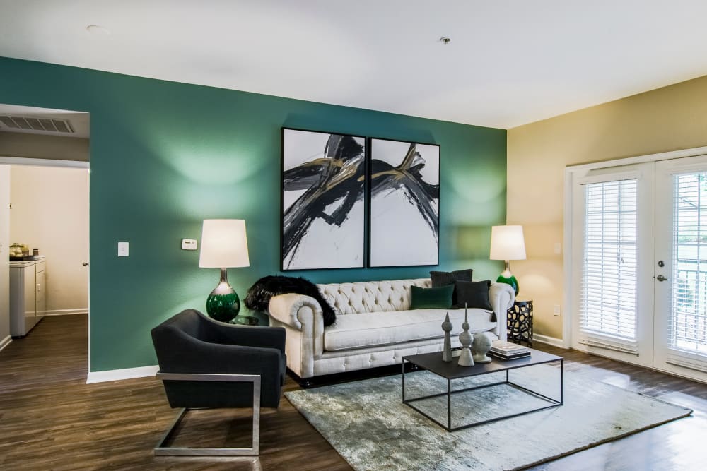 Well decorated living room at Summit at Flatirons Apartments in Broomfield, Colorado
