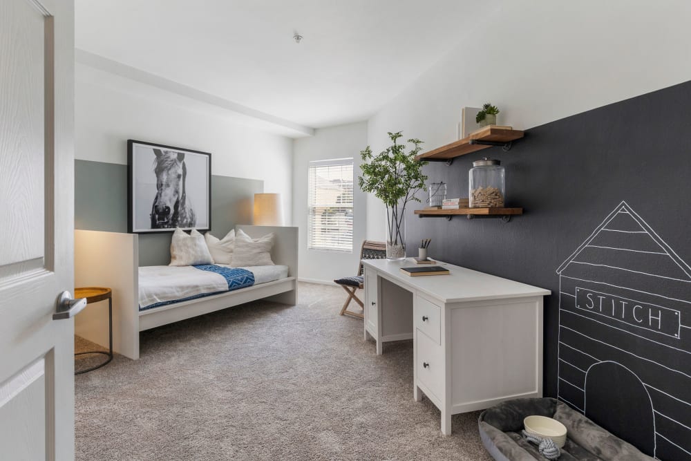 Bedroom decorated really cute in model home at Sofi at Salem Station in Salem, Massachusetts