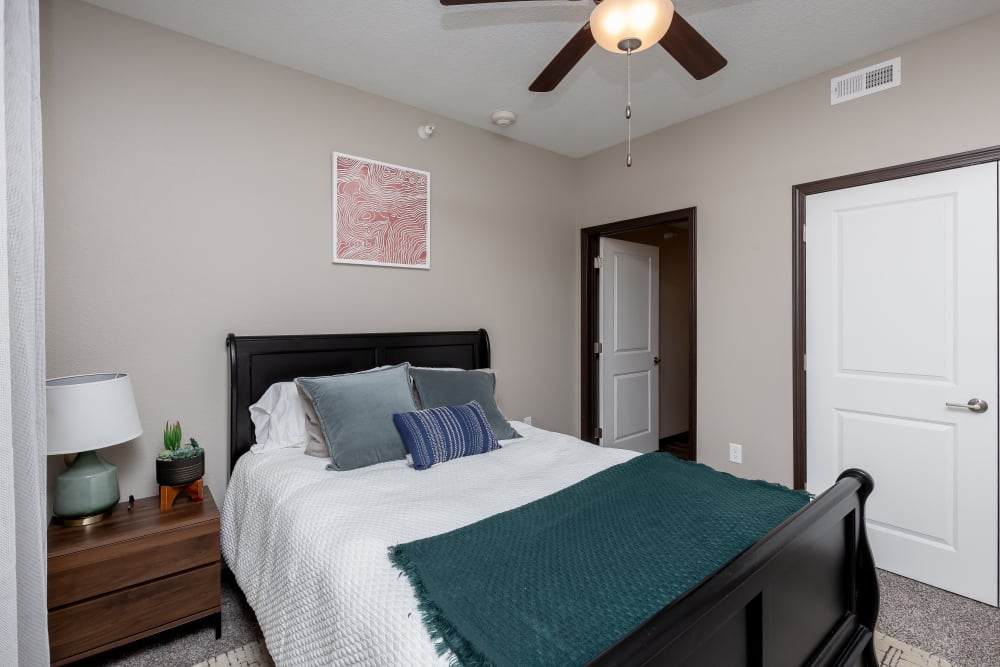 Bright primary bedroom at Autumn Ridge in Waukee, Iowa