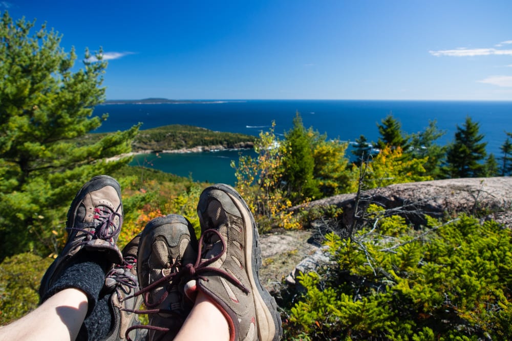 Couple enjoying the views after a hike near The Beacon at Gateway in Scarborough, Maine