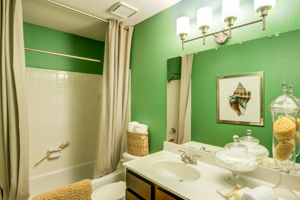 A bathroom with an oval tub at Residences at Belmont in Fredericksburg, Virginia