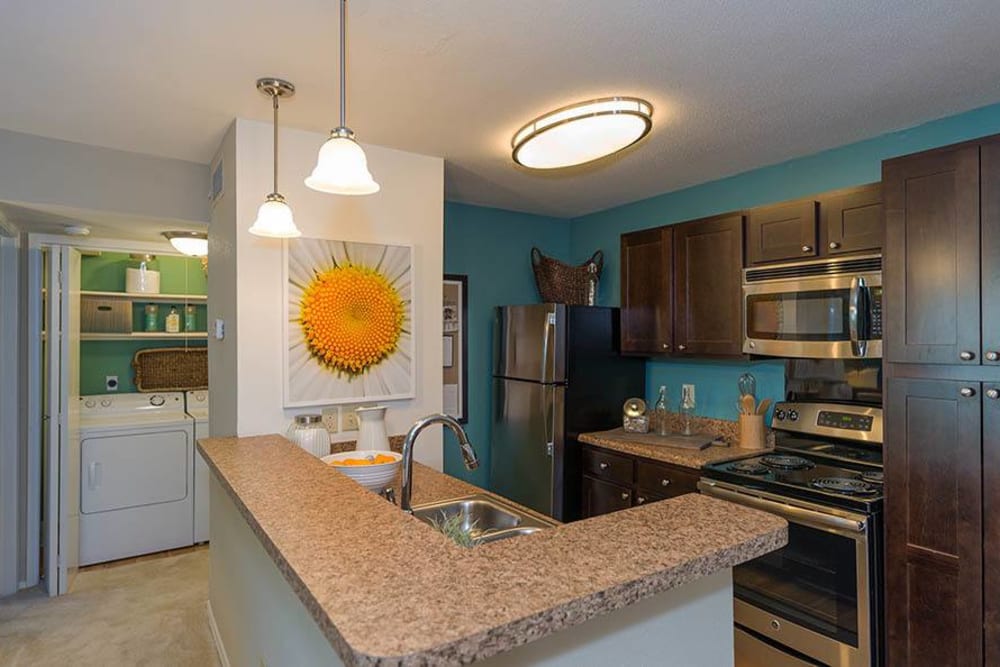 A kitchen with plenty of cabinet space at Residences at Belmont in Fredericksburg, Virginia