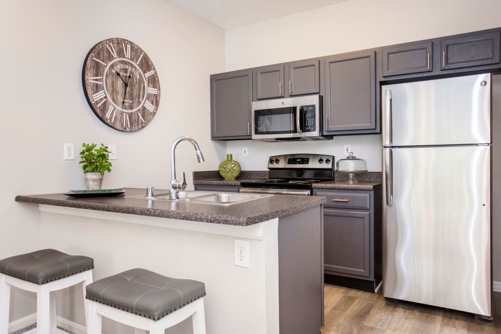 A kitchen with stainless-steel appliance at Southgate Landing in Louisville, Kentucky