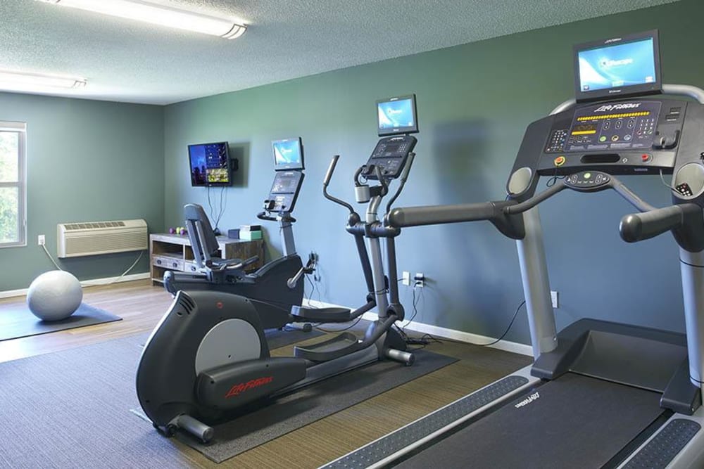 Resident gym with individual workout stations at The Barrington in Woodbury, Minnesota