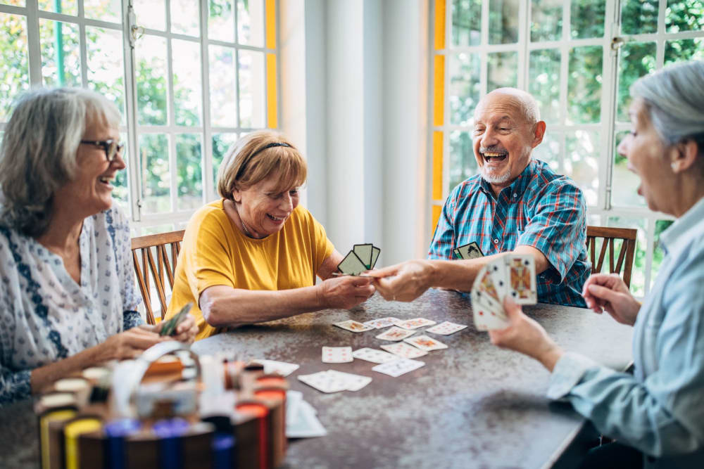 Friends hanging out in their apartment at Hilltop Commons Senior Living in Grass Valley, California