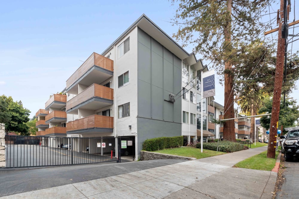 Exterior view at dusk of our classic, mid-century community at Sofi Redwood Park in Redwood City, California