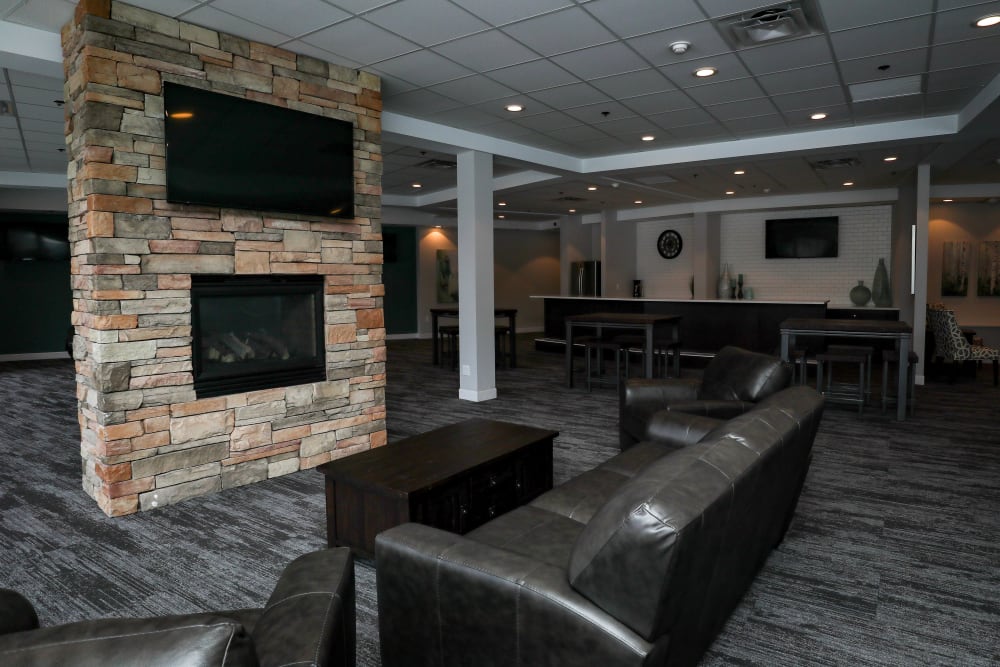 Clubroom with fireplace at Creekview Court in Getzville, New York
