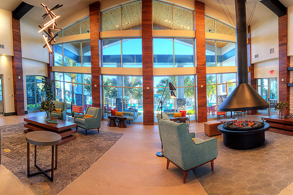 High ceiling and seating next to a window at Integra Crossings in Sanford, Florida