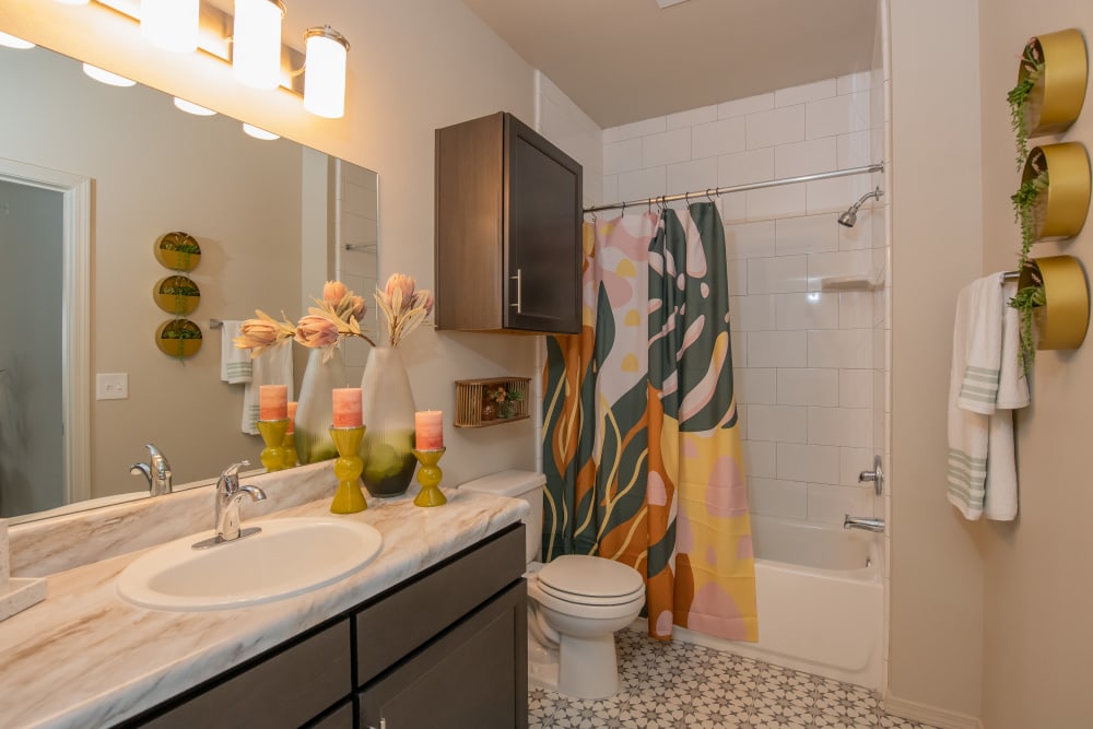Cute bathroom with lots of lighting at Artisan Crossing in Norman, Oklahoma