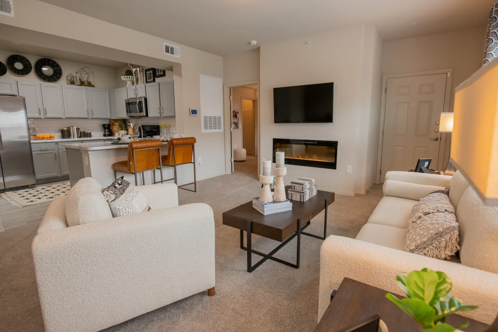 Living room with fireplace at Artisan Crossing in Norman, Oklahoma