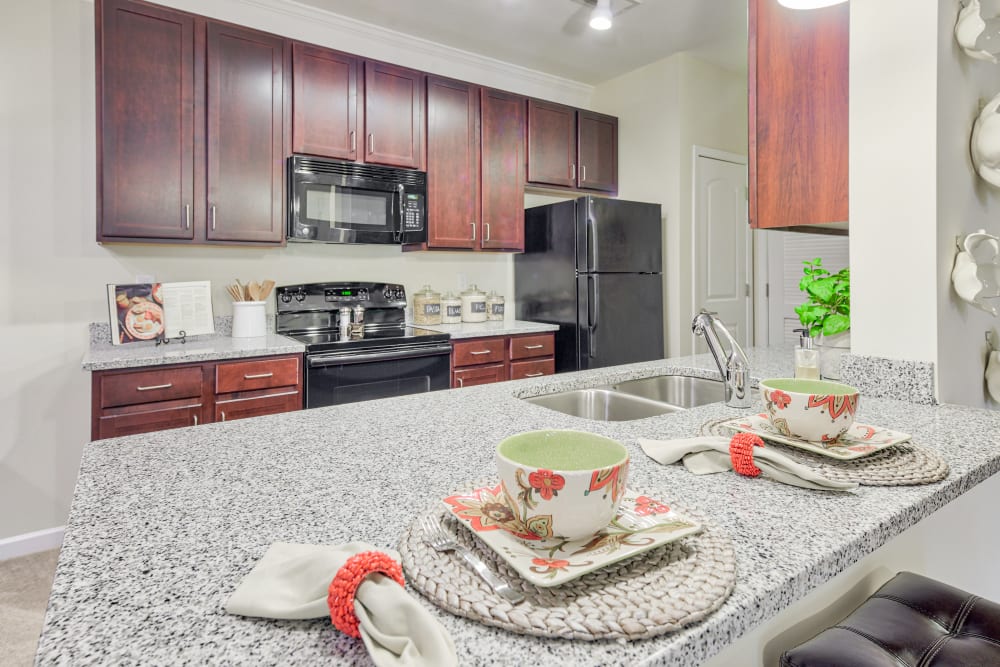 Kitchen at Oasis at Montclair Apartments in Dumfries , VA