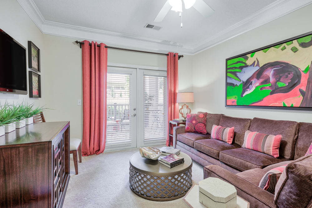 Living room at Oasis at Montclair Apartments in Dumfries , VA