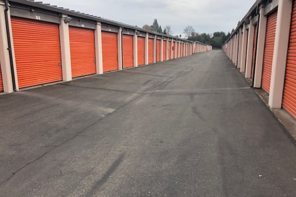 A wide driveway between units at Armor Self Storage in Sacramento, California